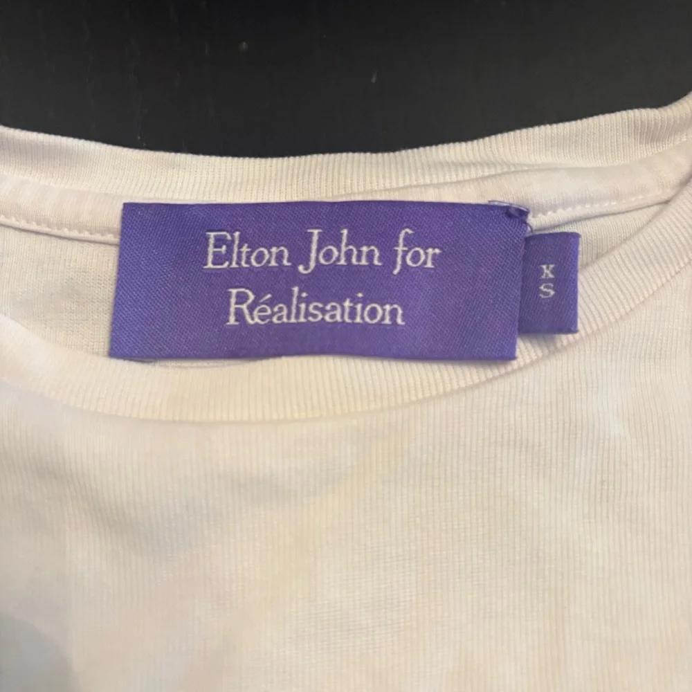 Realisation Par Elton John Limited Edition Graphic Baby Tee - Picture 5 of 6